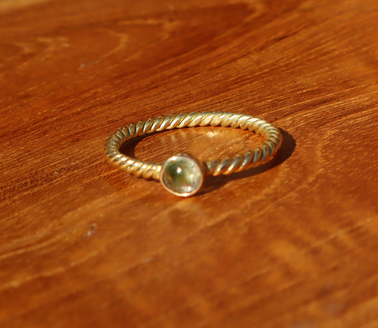 Lolite Cabochon on a 18Yellow Twisted Gold Ring