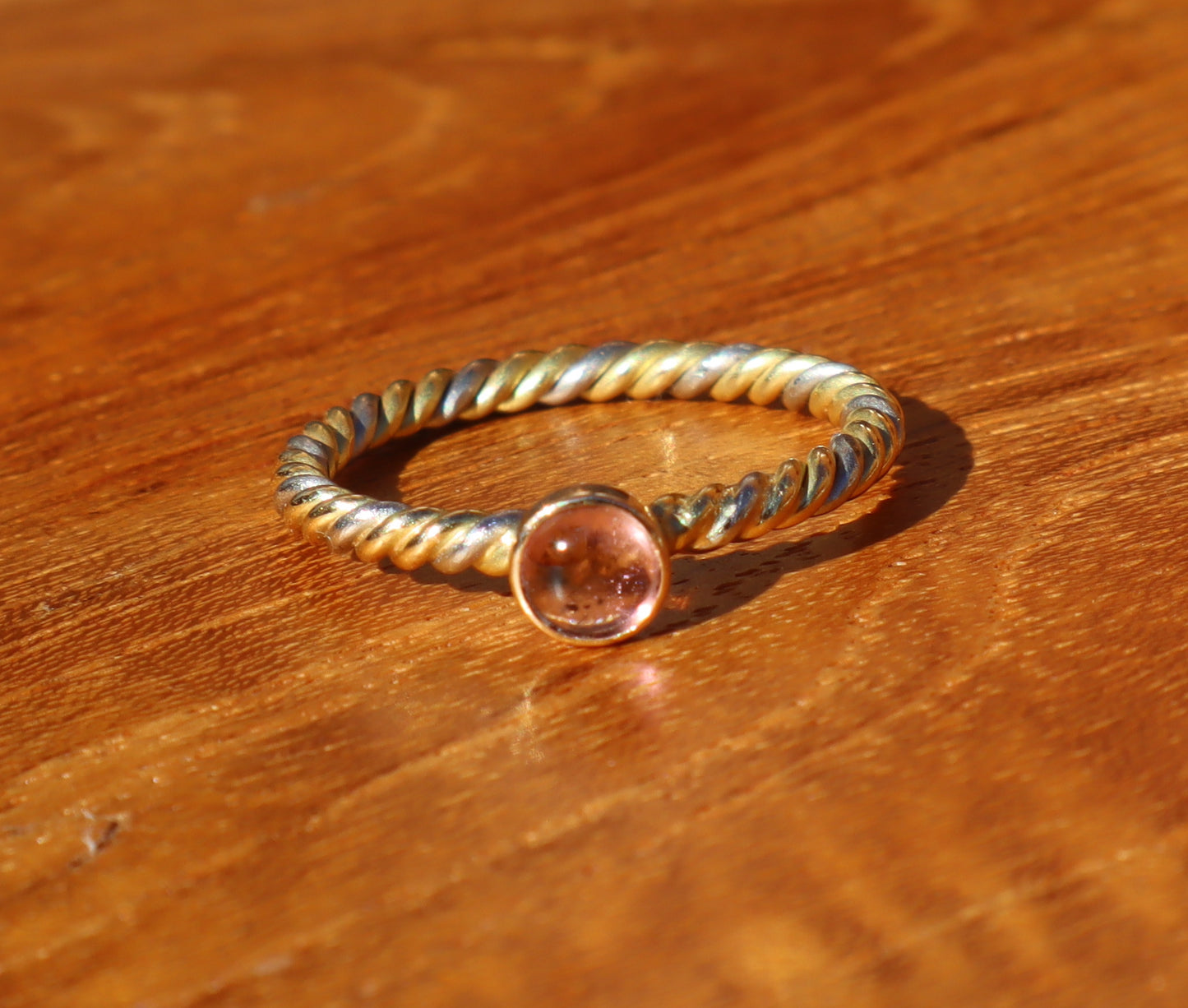 Lolite Cabochon on a 18Yellow Twisted Gold Ring